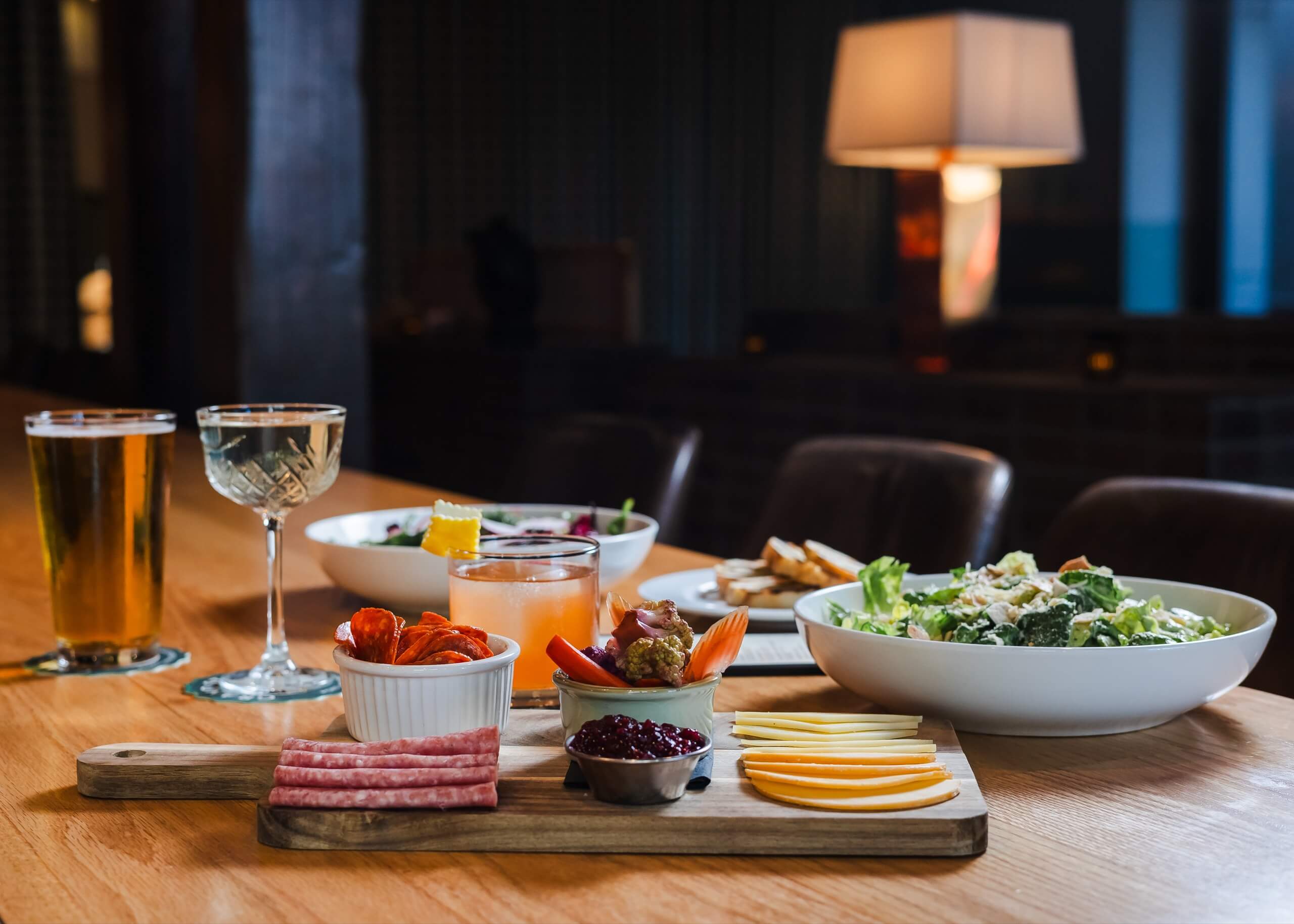 A table setting with a variety of food and drinks